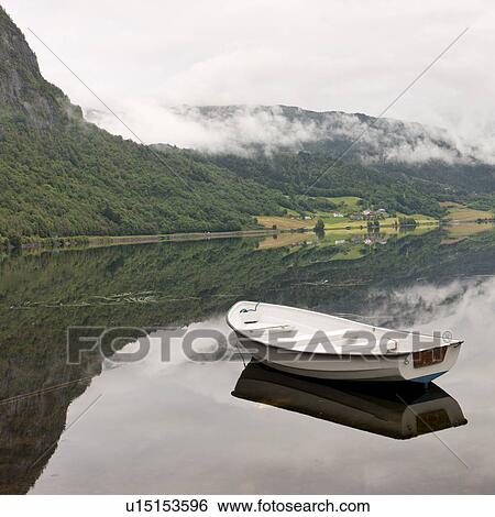 Boat in a lake, Granvinsvatnet, Granvin, Hordaland County, Norway View Large Photo Image Stock Photograph - Boat in a lake, Granvinsvatnet, Granvin, Hordaland County, Norway. Fotosearch