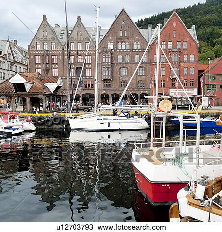 Stock Image - Boats at wharf, Bryggen, Bergen, Norway. Fotosearch