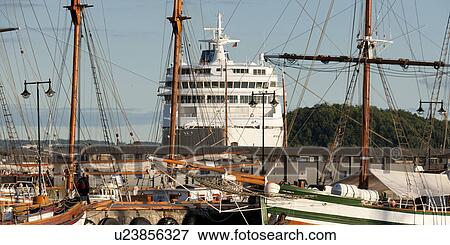 Stock Photo - Boats with cruise ship at harbor, Oslofjord, Oslo, Norway. Fotosearch