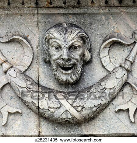Close-up of a human face carved on a wall, Bergen, Norway View Large Photo Image Stock Photography - Close-up of a human face carved on a wall, Bergen, Norway. Fotosearch