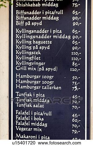 Stock Image - Close-up of a menu on blackboard at a restaurant, Oslo, Norway. Fotosearch