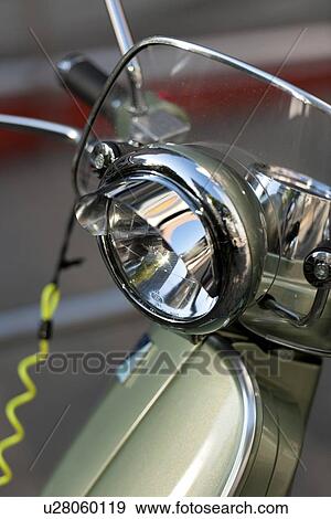 Close-up of headlight of a motor scooter, Oslo, Norway View Large Photo Image Stock Photo - Close-up of headlight of a motor scooter, Oslo, Norway. Fotosearch