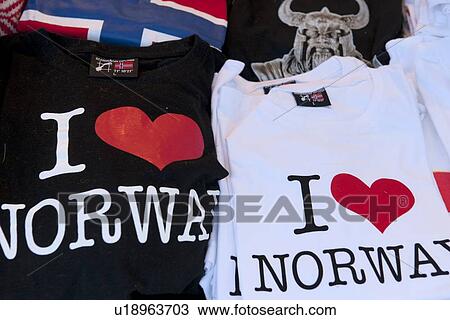 Stock Image - Close-up of souvenir t-shirts at a store, Oslo, Norway. Fotosearch