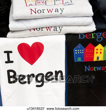 Stock Photo - Close-up of souvenir t-shirts at a store, Bergen, Norway. Fotosearch