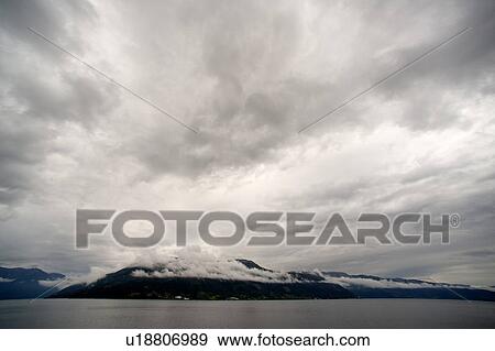 Clouds over the fjord, Hardanger, Hardangerfjord, Hardangervidda, Hardanger, Norway View Large Photo Image Stock Photo - Clouds over the fjord, Hardanger, Hardangerfjord, Hardangervidda, Hardanger, Norway. Fotosearch