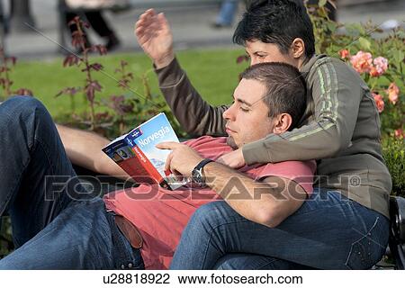 Couple reading a book, Oslo, Norway View Large Photo Image Stock Image - Couple reading a book, Oslo, Norway. Fotosearch