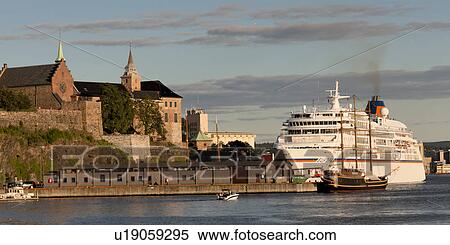 Stock Photography - Cruise ship at a harbor near Akershus Fortress, Oslofjord, Oslo, Norway. Fotosearch
