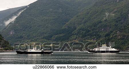 Stock Photograph - Ferries in a river, Hardangervidda, Hardanger, Norway. Fotosearch