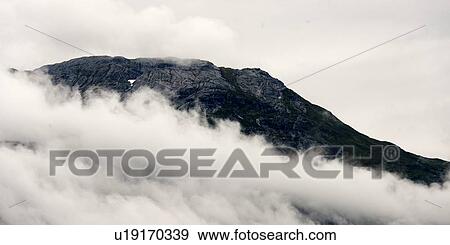 Fog around mountain, Hardangervidda, Hardanger, Norway View Large Photo Image Stock Photo - Fog around mountain, Hardangervidda, Hardanger, Norway. Fotosearch