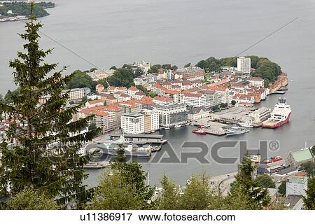 Stock Photo - High angle view of a city at the waterfront, Bergen, Norway. Fotosearch