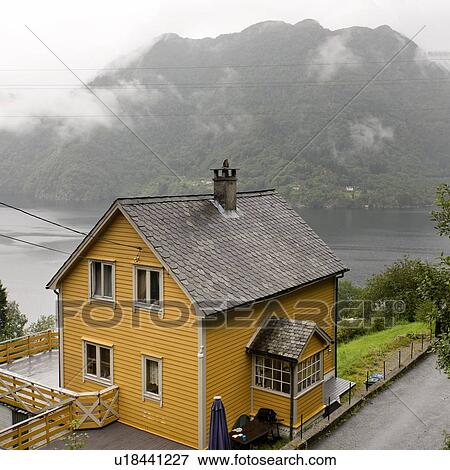 Stock Photo - High angle view of a house, Sorfjord, Norway. Fotosearch