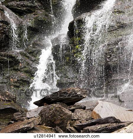 Stock Image - Low angle view of a waterfall, Hardangervidda, Hardanger, Norway. Fotosearch