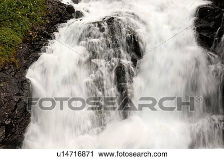 Stock Image - Low angle view of a waterfall, Kjosfossen, Norway. Fotosearch