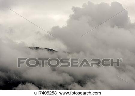 Stock Photo - Low angle view of fog over mountain, Hardangervidda, Hardanger, Norway. Fotosearch