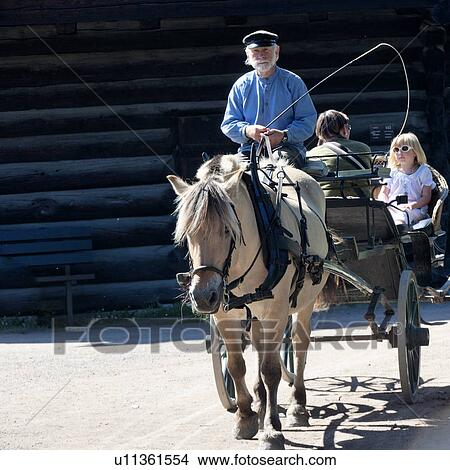Picture - Man riding a horsedrawn, Norsk Folkemuseum, Oslo, Norway. Fotosearch