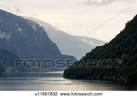 Stock Image - Mountains at coast, Granvin, Hardanger, Hardangerfjord, Hardangervidda, Hardanger, Norway. Fotosearch