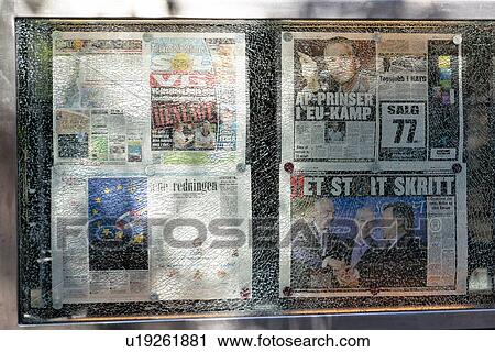 Stock Image - Newspaper articles on board, Oslo, Norway. Fotosearch