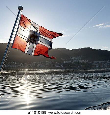 Norwegian flag on the edge of a boat, Norway View Large Photo Image Stock Photo - Norwegian flag on the edge of a boat, Norway. Fotosearch