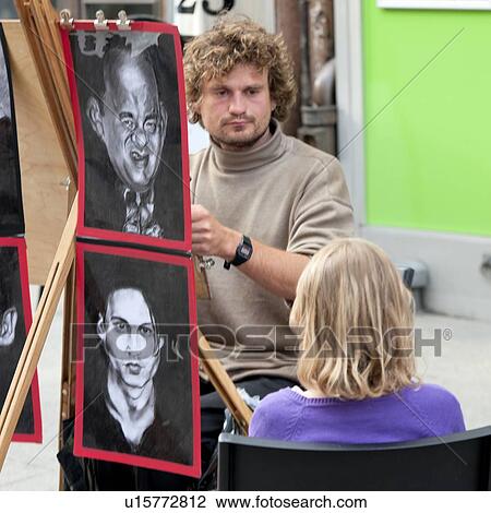 Stock Image - Painter drawing a picture of a woman, Oslo, Norway. Fotosearch