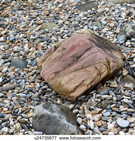 Stock Photo - Pebbles and rocks on the coast, Hardangervidda, Hardanger, Norway. Fotosearch
