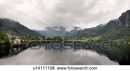 Reflection of clouds in Hardangerfjord, Hardanger, Hardangervidda, Hardanger, Norway View Large Photo Image Stock Photo - Reflection of clouds in Hardangerfjord, Hardanger, Hardangervidda, Hardanger, Norway. Fotosearch