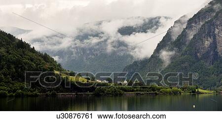 Reflection of mountains on water, Granvinsvatnet, Granvin, Hordaland County, Norway View Large Photo Image Stock Image - Reflection of mountains on water, Granvinsvatnet, Granvin, Hordaland County, Norway. Fotosearch