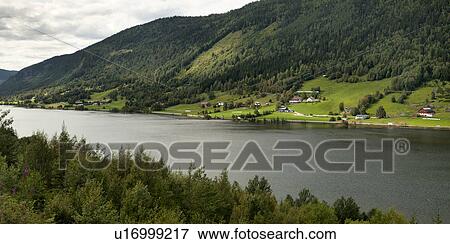 River with village in the background, Norway View Large Photo Image Stock Photo - River with village in the background, Norway. Fotosearch