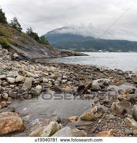 Stock Image - Rocks at the riverside, Hardangervidda, Hardanger, Norway. Fotosearch