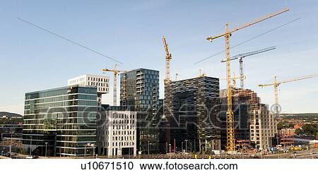 Skyscrapers and cranes in Oslo, Norway View Large Photo Image Stock Image - Skyscrapers and cranes in Oslo, Norway. Fotosearch