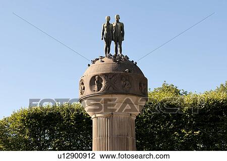 Statues of a couple on column, Oslo, Norway View Large Photo Image Stock Image - Statues of a couple on column, Oslo, Norway. Fotosearch