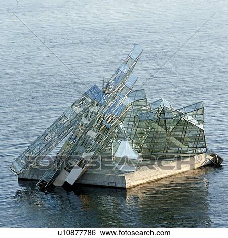 The floating glass and steel monument 'She Lies' in the sea, Oslo Harbor, Oslofjord, Oslo, Norway View Large Photo Image Stock Photograph - The floating glass and steel monument 'She Lies' in the sea, Oslo Harbor, Oslofjord, Oslo, Norway. Fotosearch
