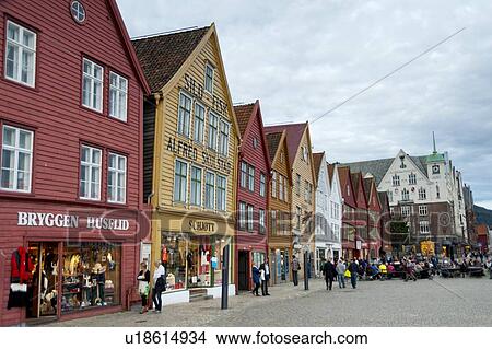 Picture - Tourists at a market, Bryggen, Bergen, Norway. Fotosearch