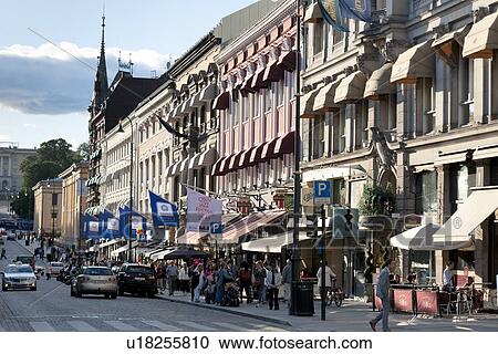 Stock Image - Tourists at a market, Karl Johans Gate, Oslo, Norway. Fotosearch