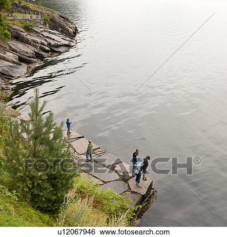 Tourists at the riverside, Hardangervidda, Hardanger, Norway View Large Photo Image Stock Photograph - Tourists at the riverside, Hardangervidda, Hardanger, Norway. Fotosearch