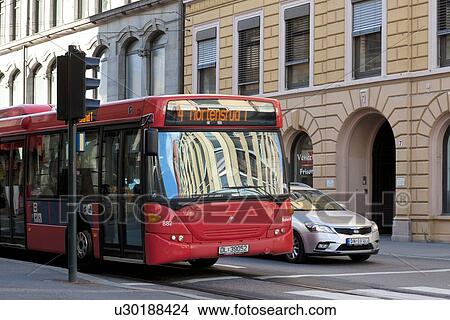 Picture - Traffic at a stoplight, Oslo, Norway. Fotosearch