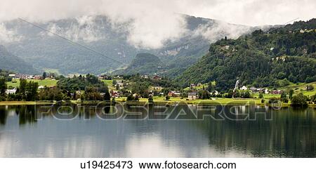 Village at waterfront, Hardanger, Hardangerfjord, Hardangervidda, Hardanger, Norway View Large Photo Image Stock Image - Village at waterfront, Hardanger, Hardangerfjord, Hardangervidda, Hardanger, Norway. Fotosearch