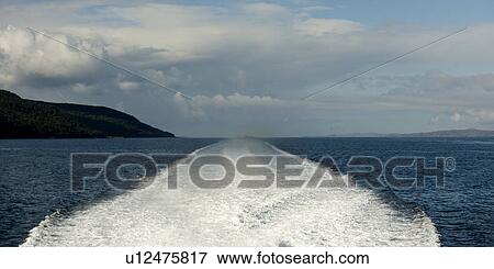 Stock Photo - Wake in a Fjord made from a moving boat, Sognefjord, Norway. Fotosearch