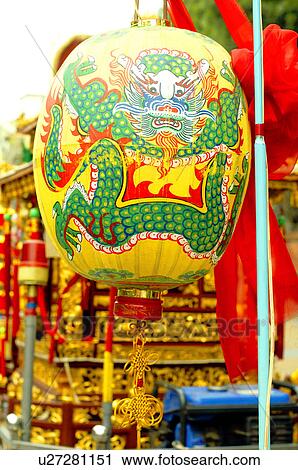 Stock Image - Chinese dragon painted on Chinese lantern. Fotosearch