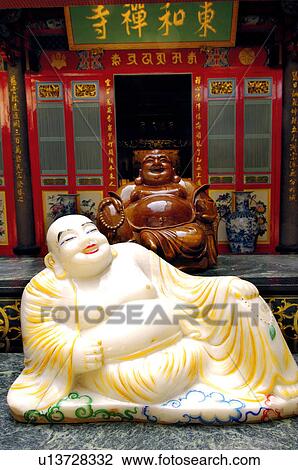 Close-up of Laughing Buddha statues View Large Photo Image Stock Image - Close-up of Laughing Buddha statues. Fotosearch