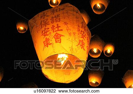 Low angle view of sky lanterns View Large Photo Image Stock Image - Low angle view of sky lanterns. Fotosearch