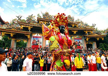 Performer performing in front of temple View Large Photo Image Stock Photograph - Performer performing in front of temple. Fotosearch