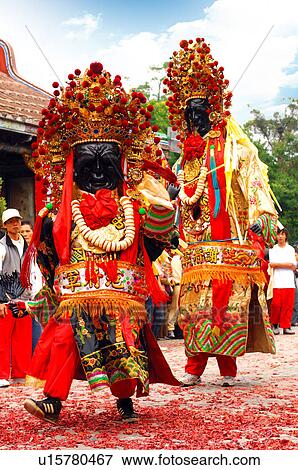 Stock Photo - Performers performing in Chinese festival. Fotosearch