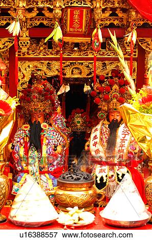 Religious offerings in front of deities View Large Photo Image Stock Photo - Religious offerings in front of deities. Fotosearch