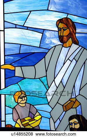 Stock Photo - Stained glass window picturing Jesus Christ. Fotosearch