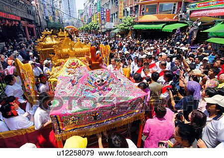 Stock Photo - Crowd with pagodas during mazu festival, China. Fotosearch