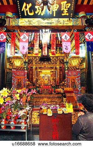 Man praying during mazu festival, China View Large Photo Image Stock Photo - Man praying during mazu festival, China. Fotosearch