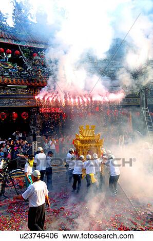 Stock Photograph - People pulling a pagoda during mazu festival, China. Fotosearch