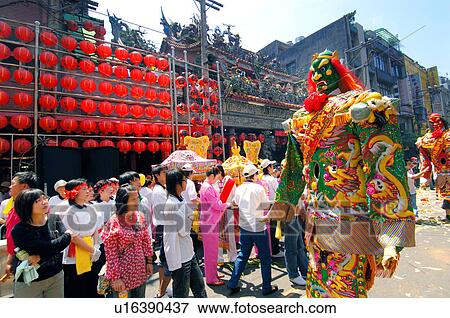Stock Photo - Spectators watching the people in traditional costume during mazu festival, China. Fotosearch