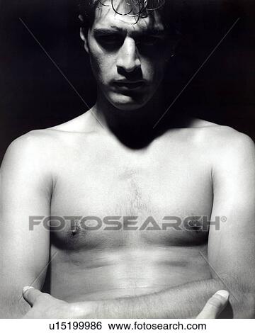 Stock Photograph - Close-up of a man posing. Fotosearch