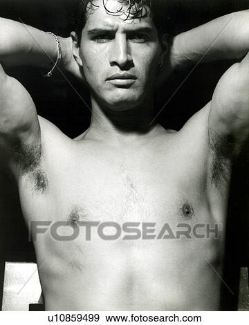 Portrait of a man posing View Large Photo Image Stock Photo - Portrait of a man posing. Fotosearch